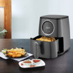 Fry chicken electric pot in the kitchen interior